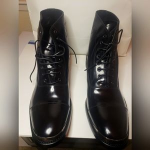 Alexander McQueen silver tipped lace up boots.